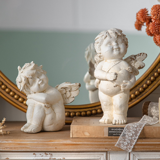 White Angel Statue Tabletop Ornaments Set on the table