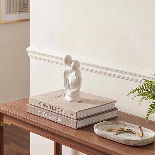 White Couple Sculpture On Wooden Console