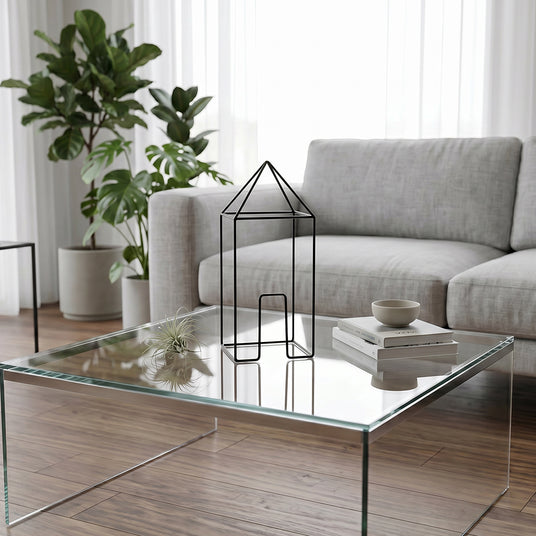 Wire house group on glass table