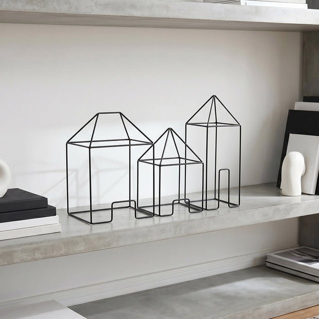 Wire house set on storage shelf