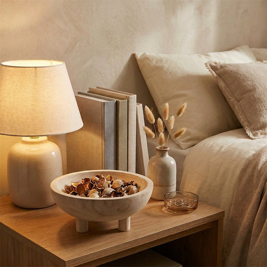 Wooden Footed Bowl On Nightstand