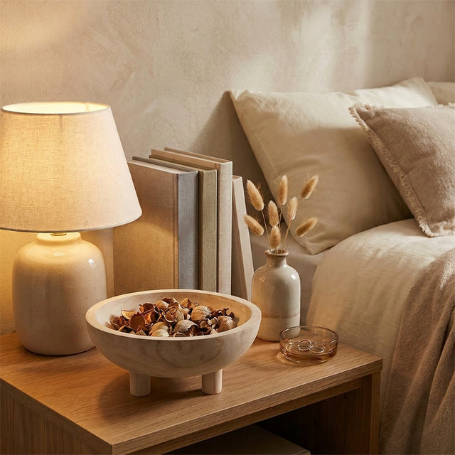 Wooden Footed Bowl On Nightstand