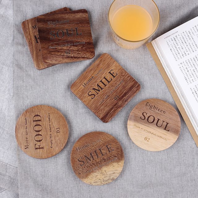 acacia wood coaster on the dining table