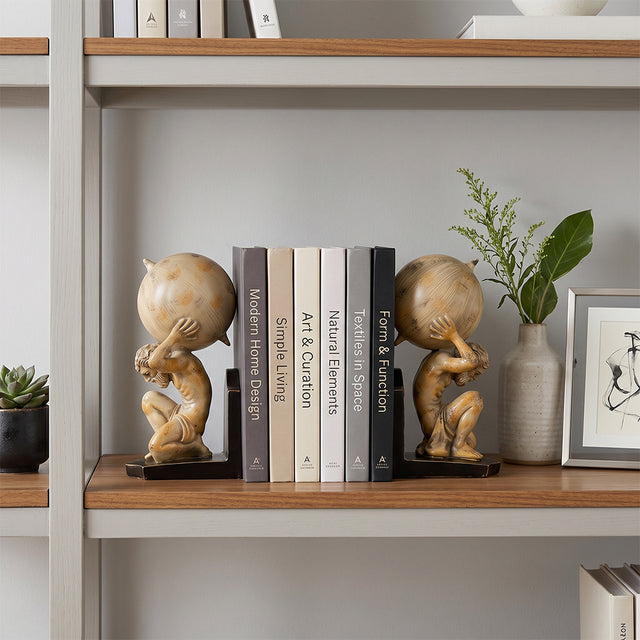 angel bookends on interior shelf