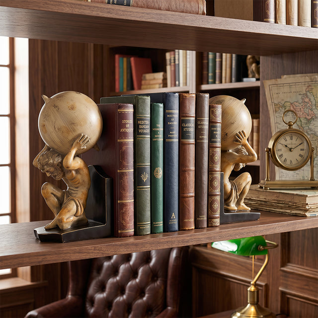 angel bookends on wooden bookshelf