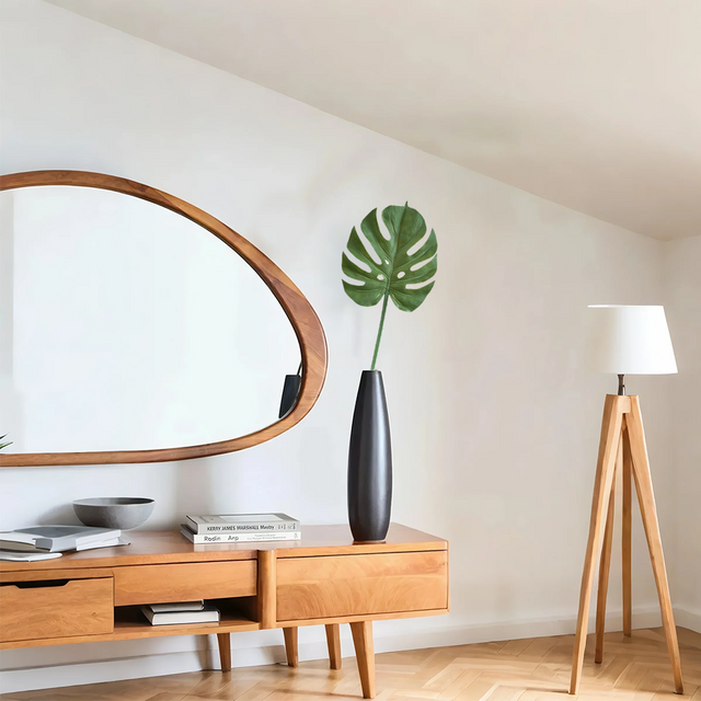 artificial monstera leaves in vase