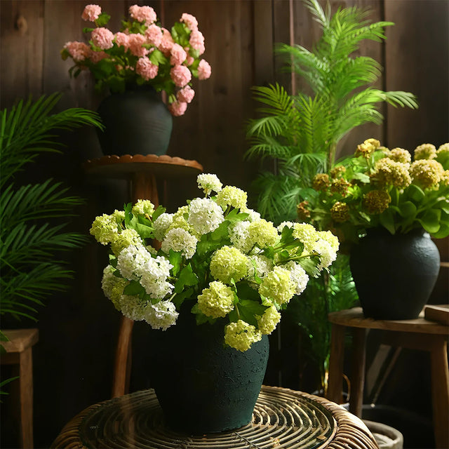 artificial snowball flower on the plant stand