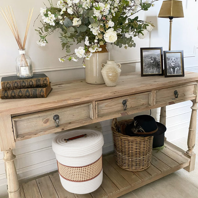 bamboo cotton rope woven storage basket with a lid on the cabinet