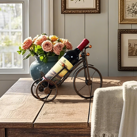 bicycle shaped wine rack on the wooden table