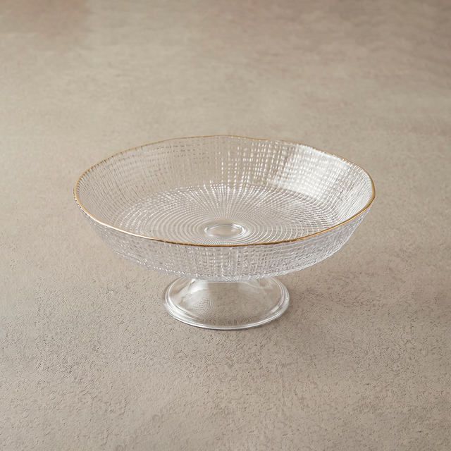 big glass bowl on beige surface