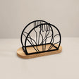 black napkin holder with wood base