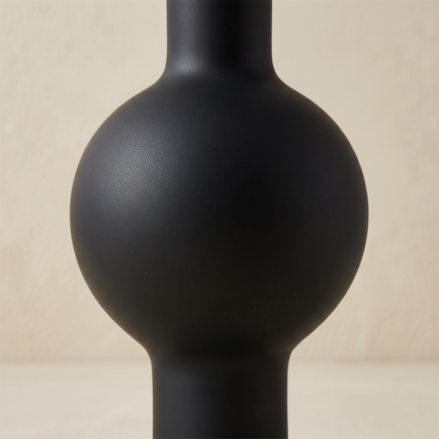 black vase body close up