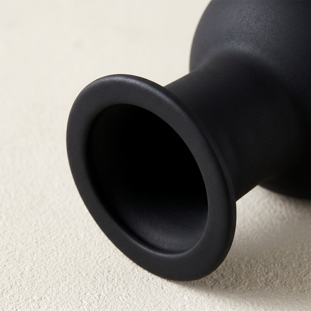 black vase rim close up