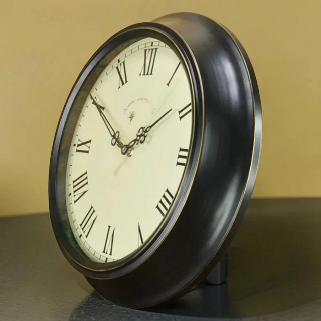 black wall clock displayed