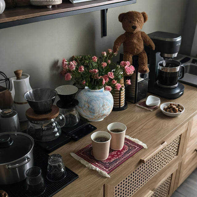 blue ceramic flower vase on the kitchen counter