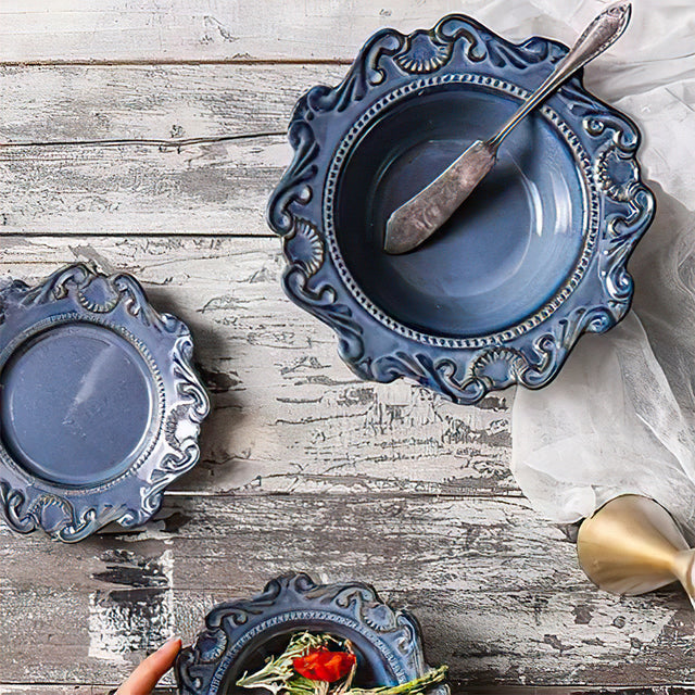 blue ceramic tableware on the wooden table