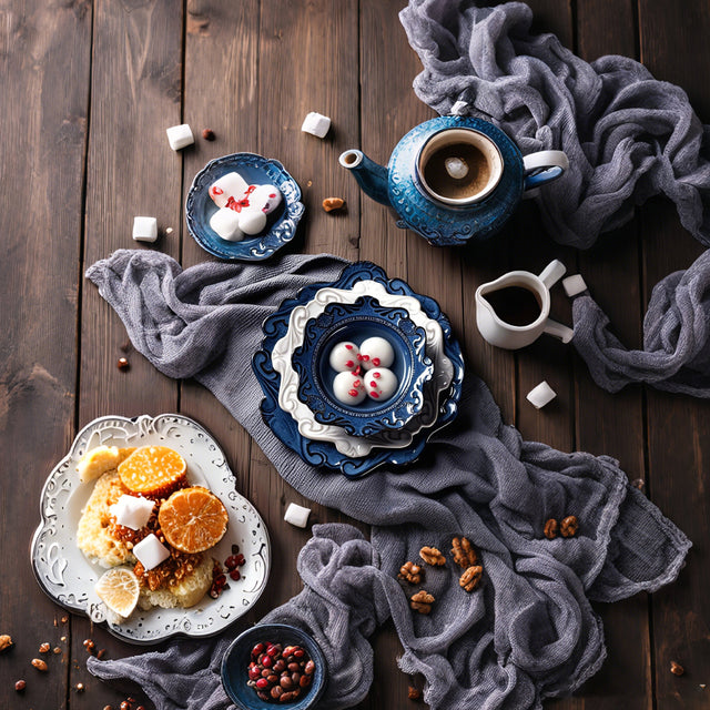 blue ceramic tableware on the wooden table