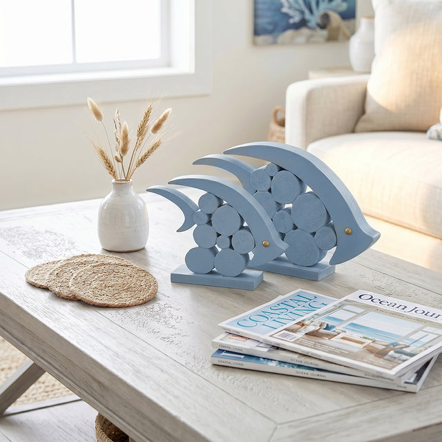 blue wooden dolphins on light wood coffee table