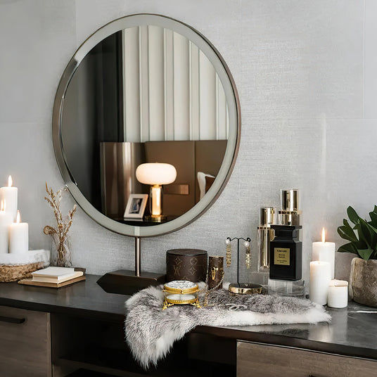 brass and glass carved decorative storage jar on the dressing table