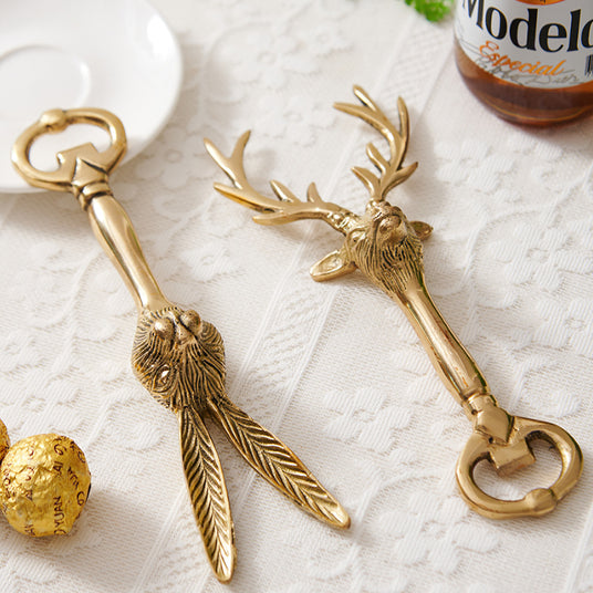 brass decorative bottle opener on the table