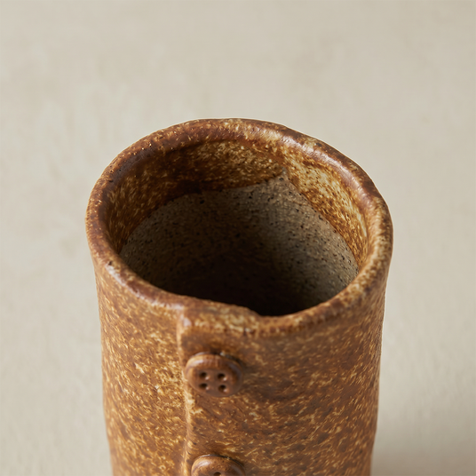 brown ceramic button vase top opening