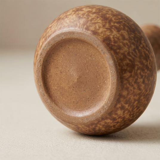 brown ceramic vase bottom base detail