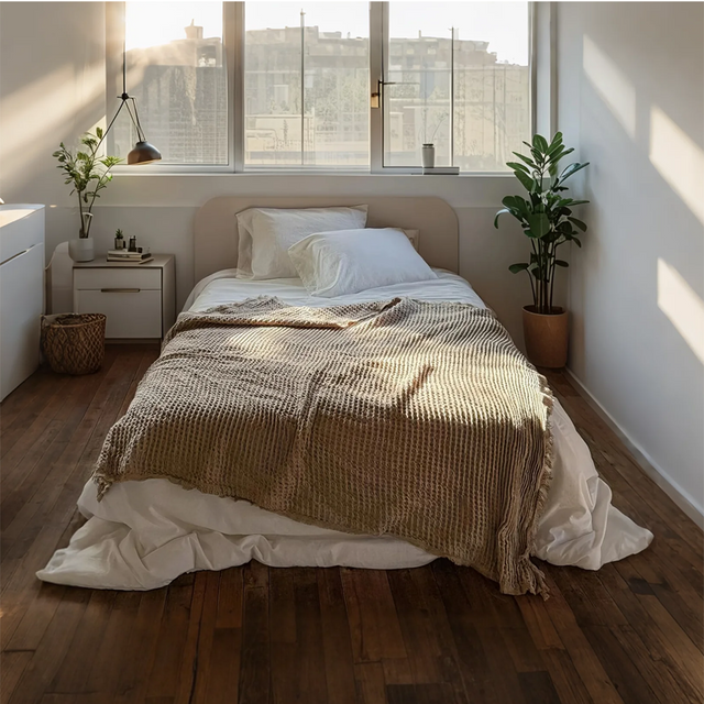 brown throw blanket in bedroom