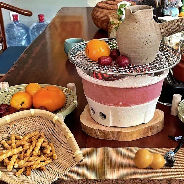 brown wood coaster used under a stove