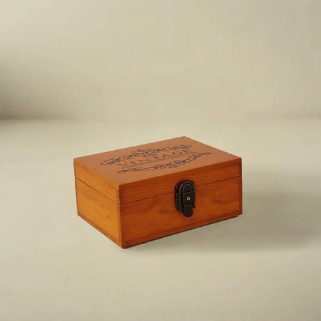 brown wooden storage box on the table