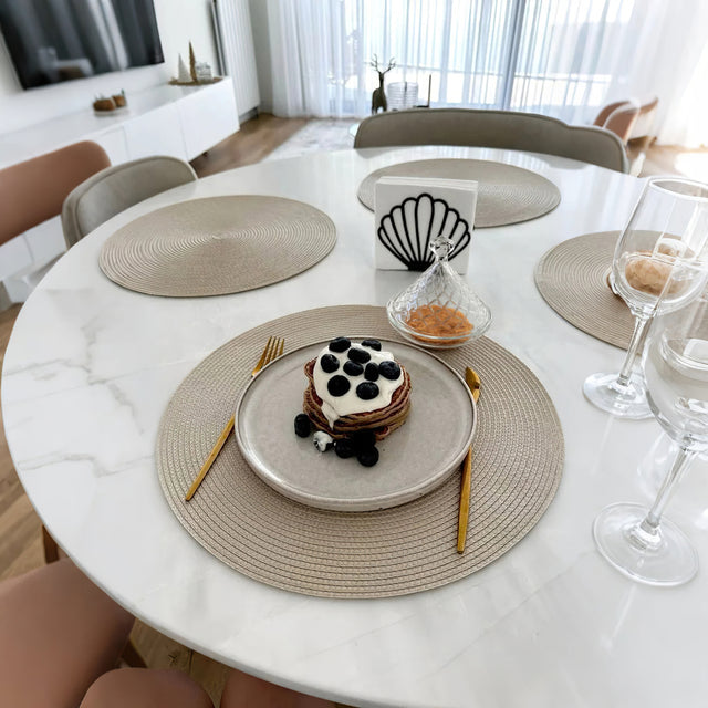 cake plate with conical lid on the dining table