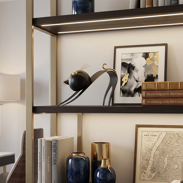 cat sculpture on shelf with blue vases