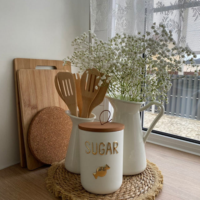 ceramic canister jar on the wooden table
