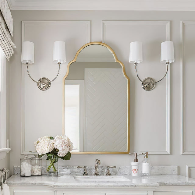 ceramic dispenser bottle on the white washbasin
