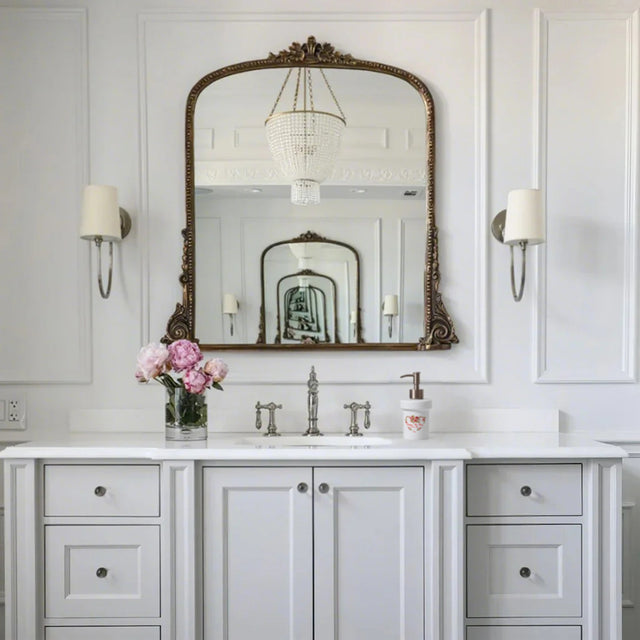 ceramic dispenser bottle on the white washbasin