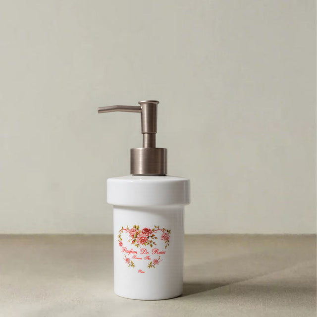 ceramic dispenser bottle with floral pattern