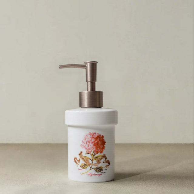 ceramic dispenser bottle with floral pattern