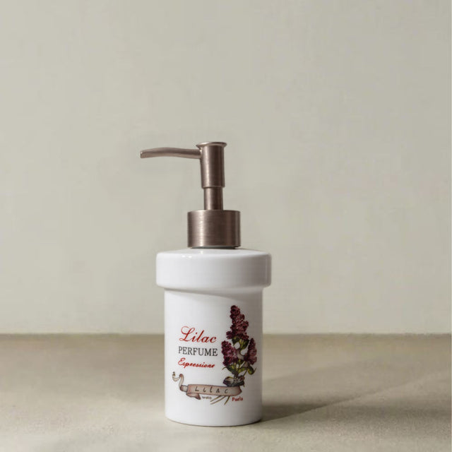 ceramic dispenser bottle with floral pattern