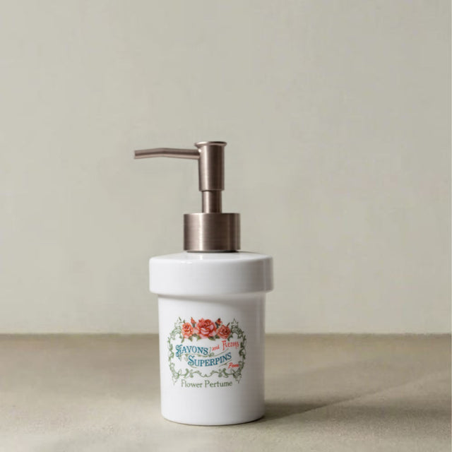 ceramic dispenser bottle with floral pattern