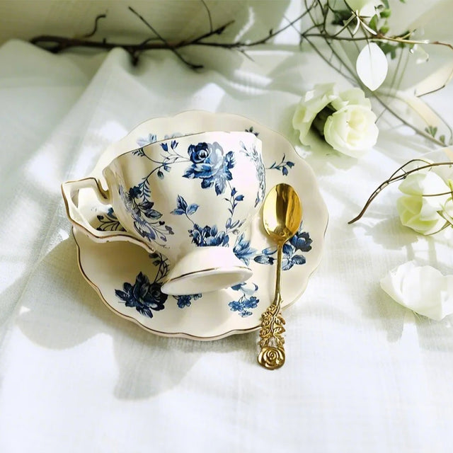 ceramic floral tea set on the tablecloth