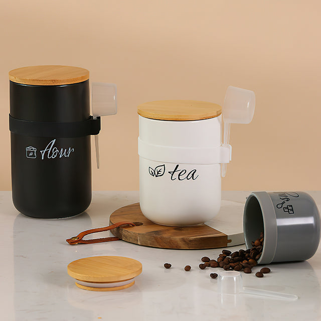 ceramic storage jar set with spoons gray black white details