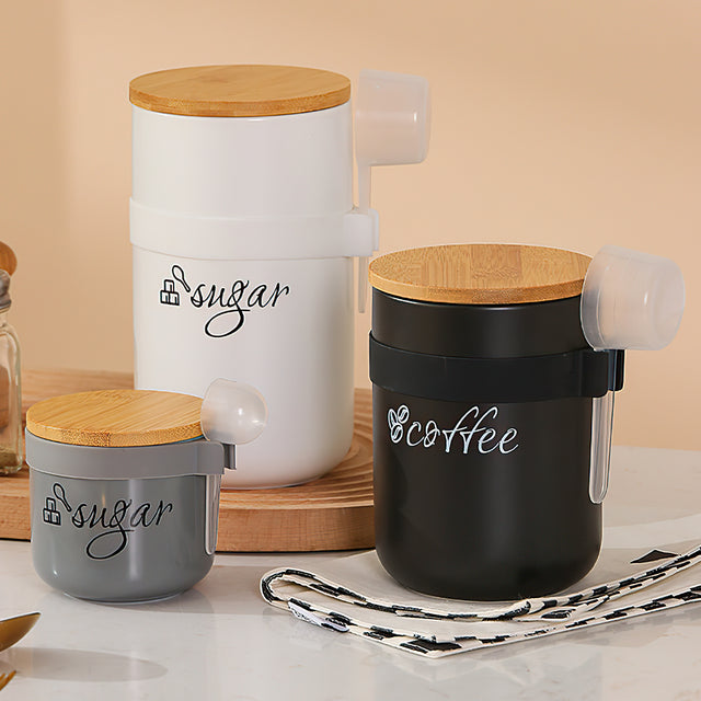 ceramic storage jar set with spoons gray black white details
