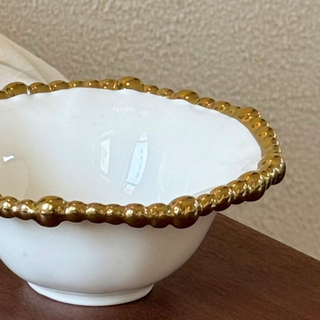 ceramic tableware with golden pearl trimmed edge details