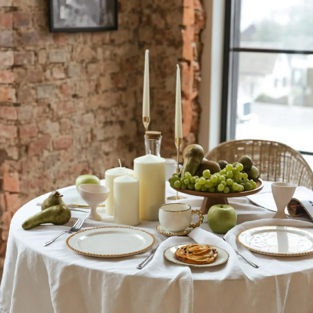 ceramic tableware with golden pearl trimmed edge on the dining table