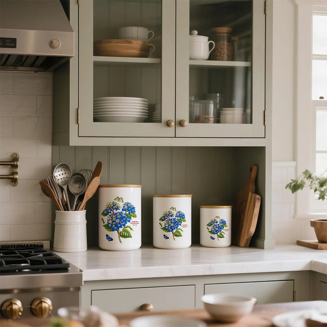 ceramic white cylinder storage jar with a wooden lid in the kitchen