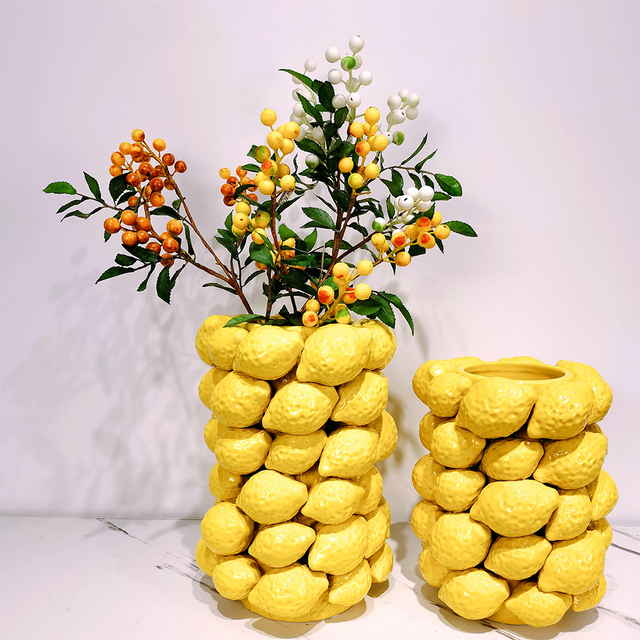 ceramic yellow cylinder lemon vase flower arrangement