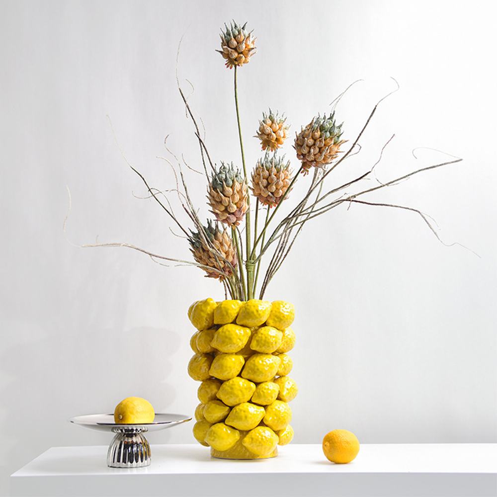 ceramic yellow cylinder lemon vase flower arrangement