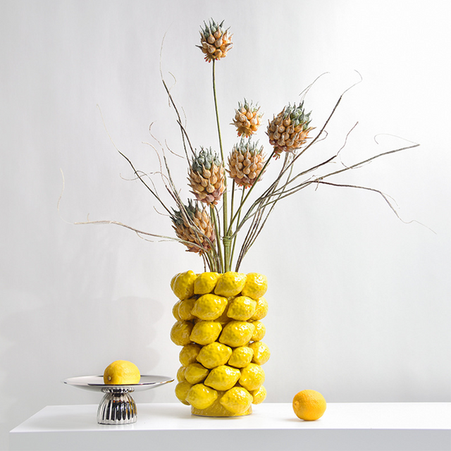 ceramic yellow cylinder lemon vase flower arrangement