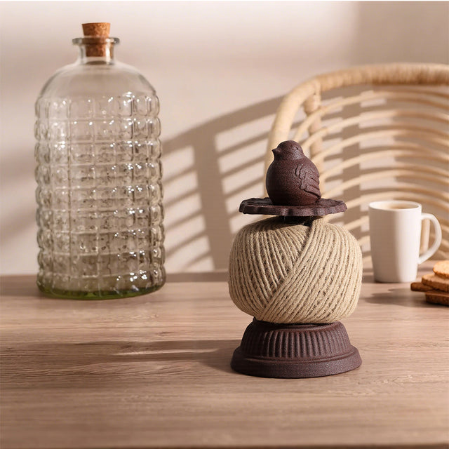 chubby bird thread spool on the table