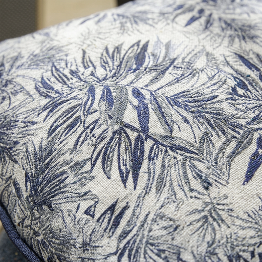 close up of blue palm leaf jacquard fabric texture
