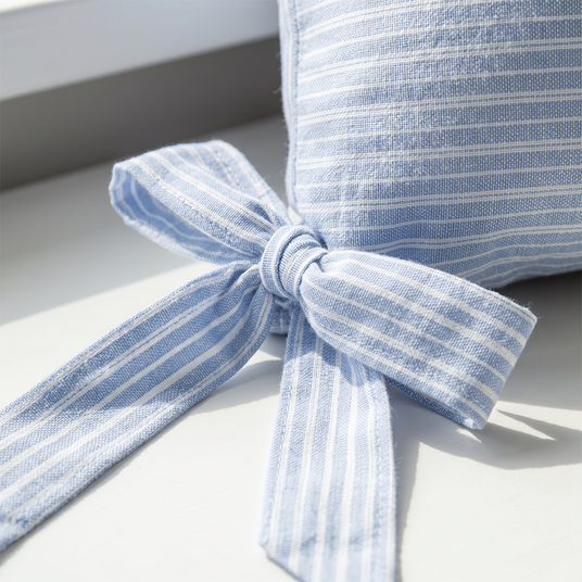 close up of blue striped bow tie detail